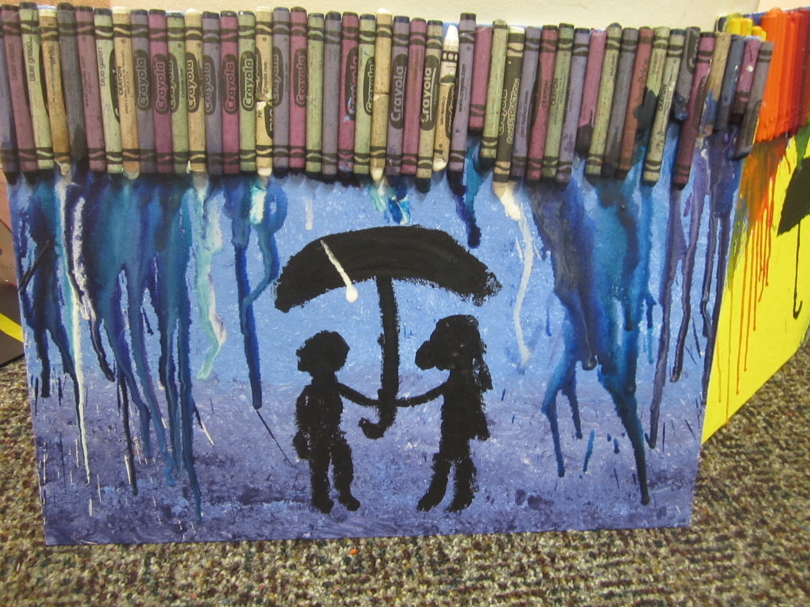 Nora's crayon art - umbrella in the rain