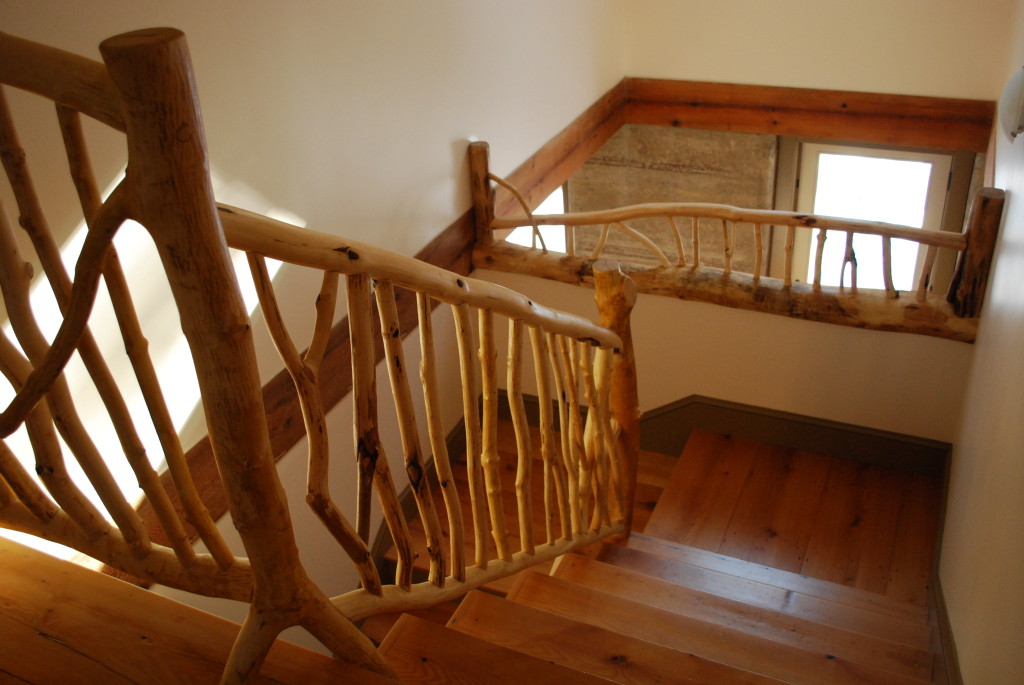 Stair Railings in Rammed Earth House - Photo by Susan Turner