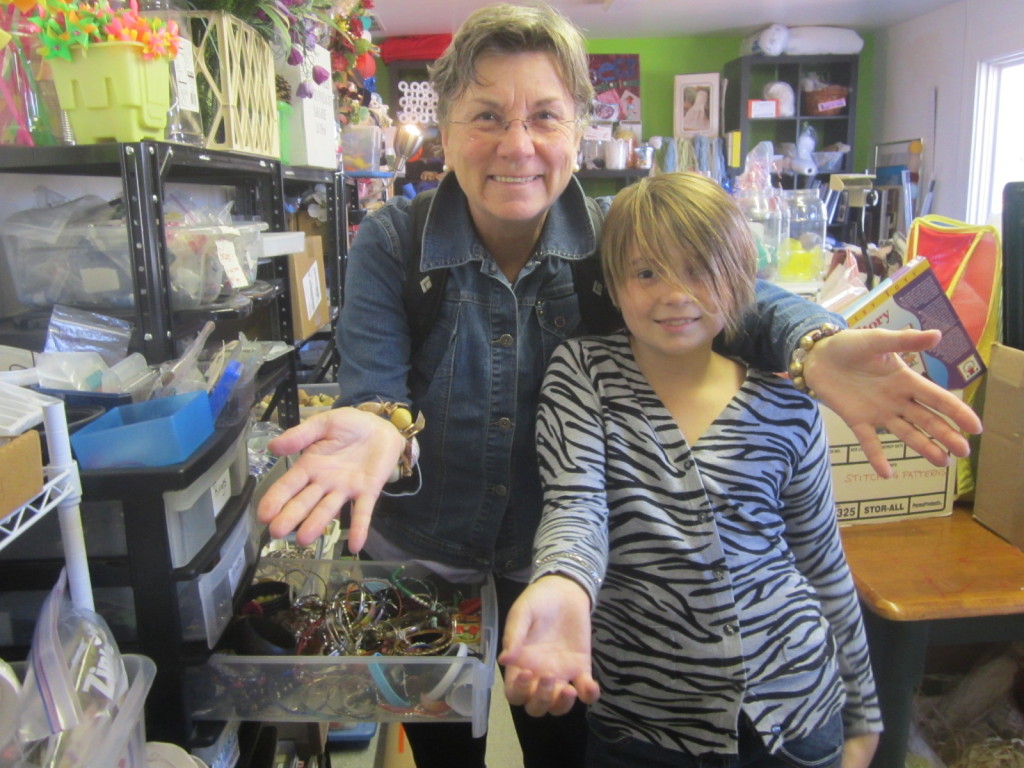 Mom & Nora love the jewelry section at Upcycle