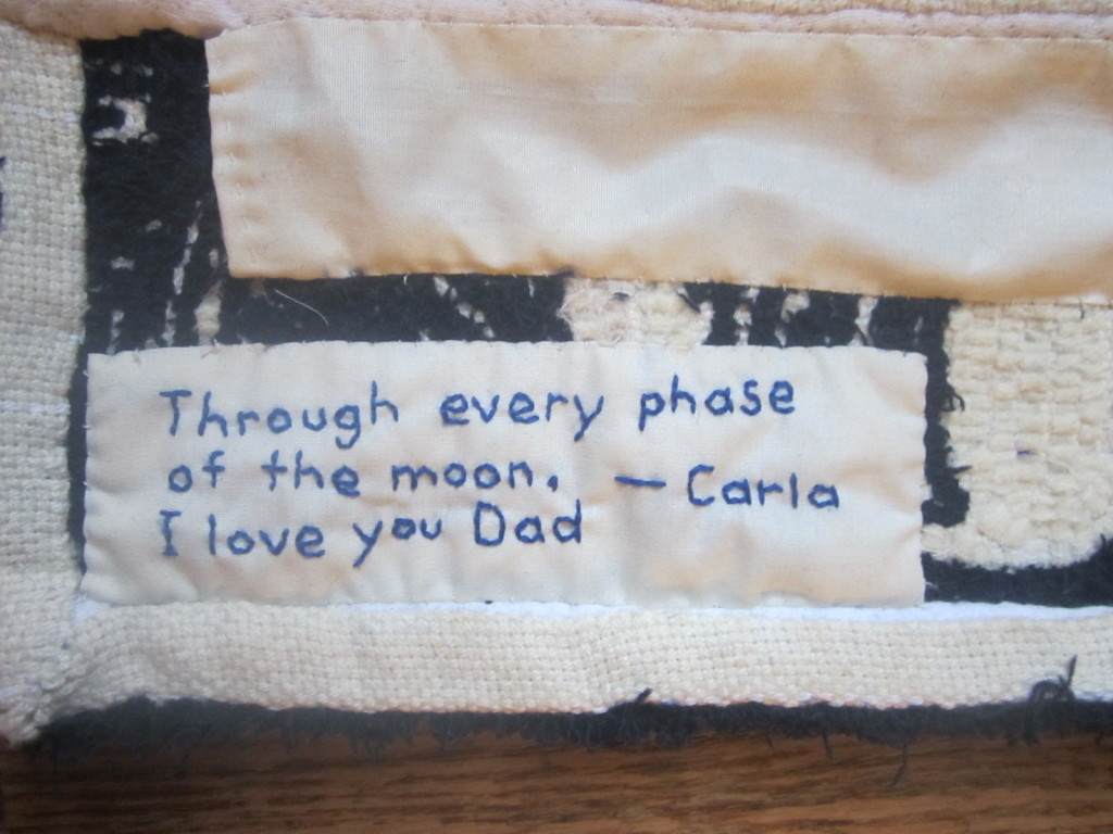 Hand-sewn label on Dad's moon phases rug