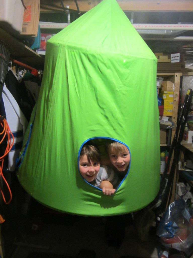 Kids in the Huggle Pod in the Laundry Room