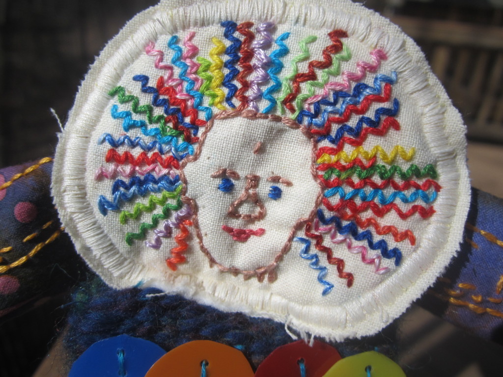 Close-up of embroidery on Wavemaker's face