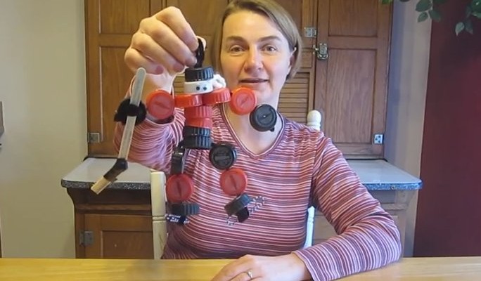 Instructional Video of how to make a person from plastic caps - hockey player example