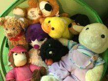Basket filled with stuffed toys