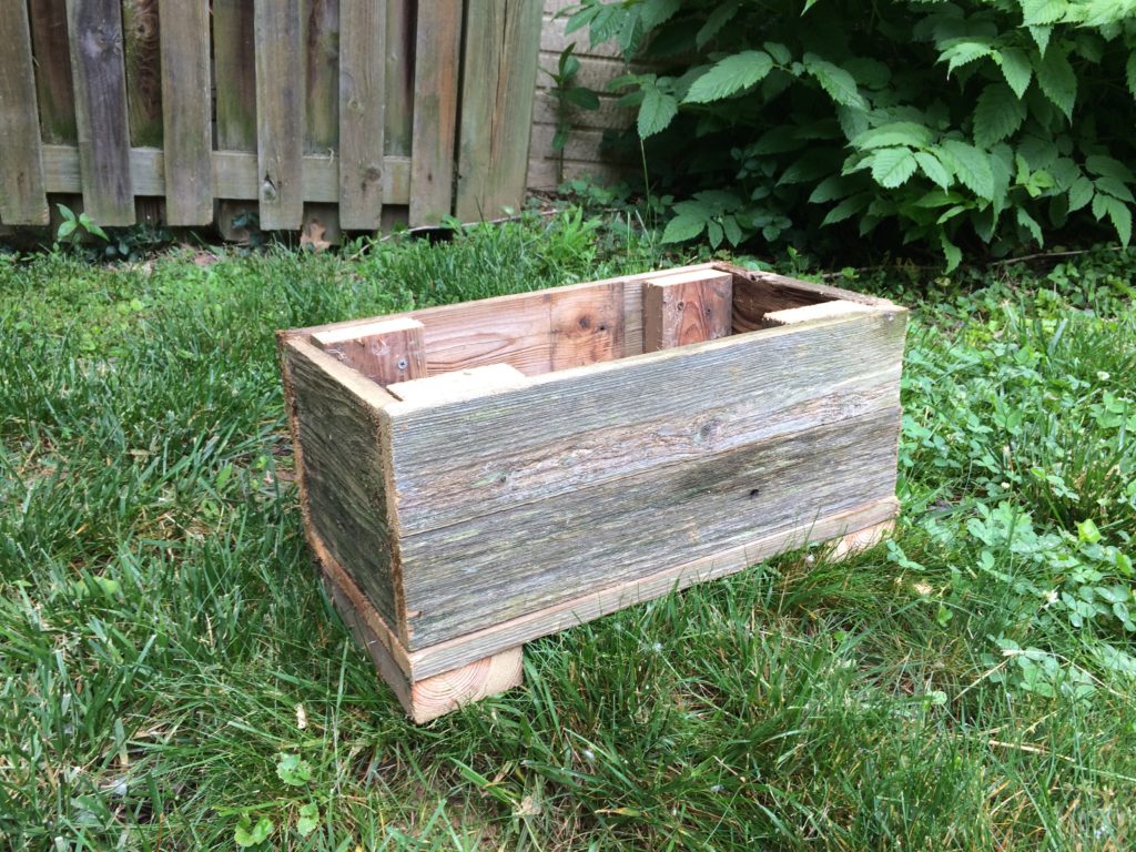 Planter box from recycled fence wood