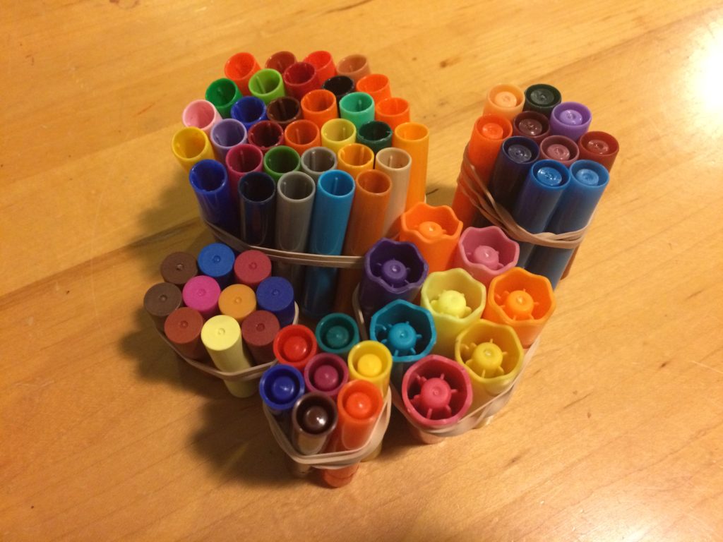 Organizing marker caps by design