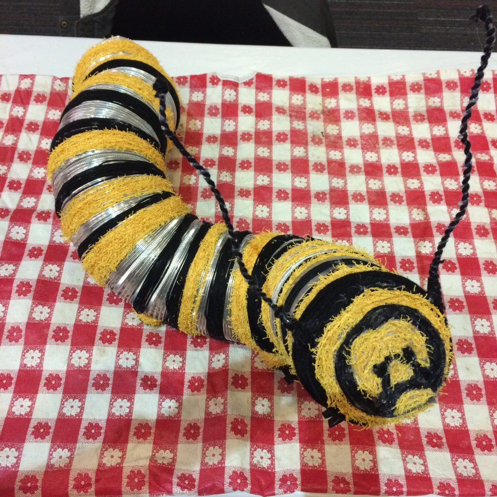 Caterpillar Recycled Art by Laura Mateer, Liberty High School