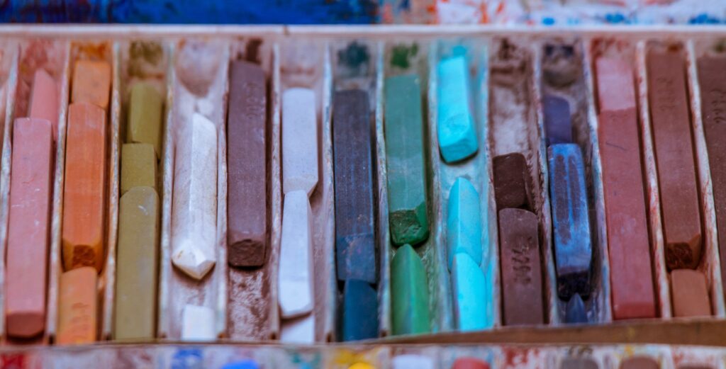 Box of pastels - photo by Steve Johnson, Pexels