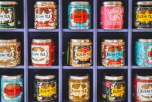 Tea tins on square shelves by Jonathan Kemper, Unsplash