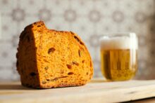 A chunk of brown bread with a glass of beer - photo by Gianluca Gerardi