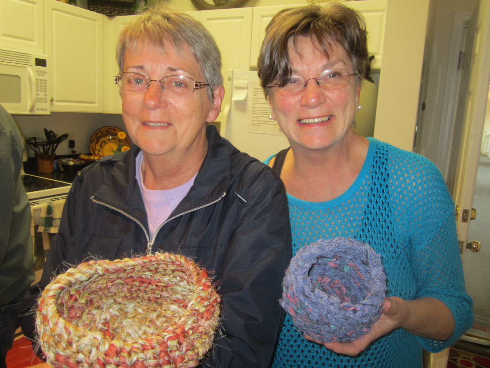 Juliene and Mom show their crocheted baskets