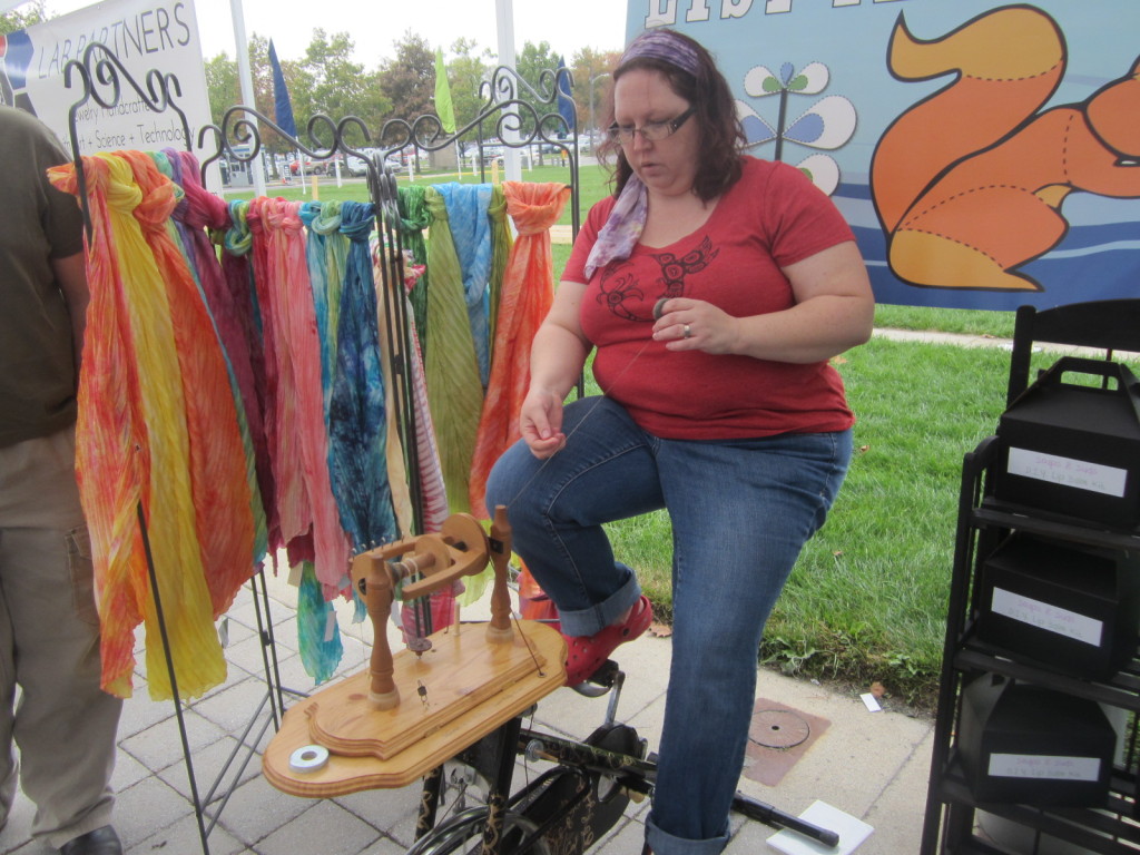 Joy Cain and her bicycle spinning wheel