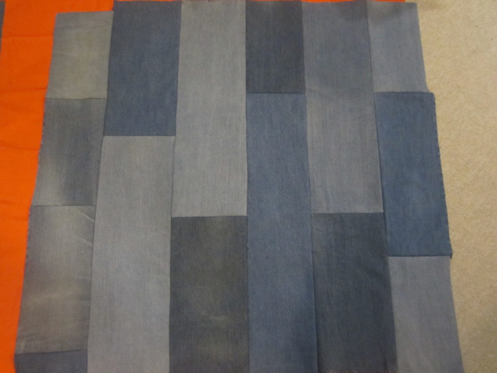 Strips of jeans sewn together for our cushion