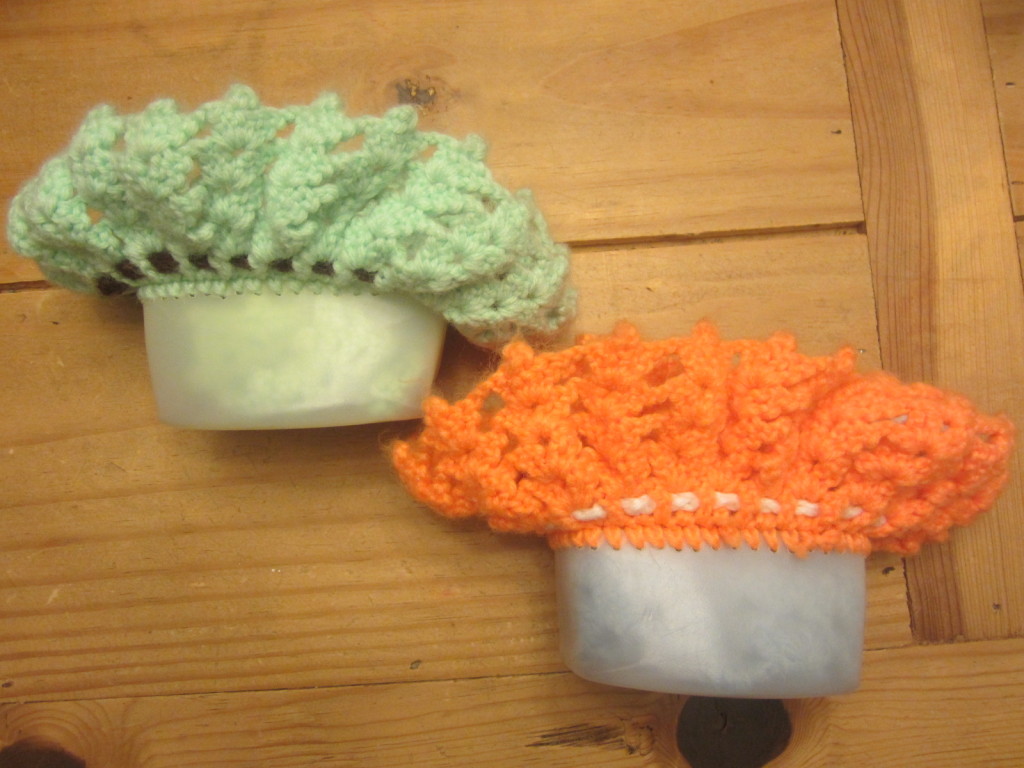 Crocheted doll beds from plastic dish soap containers
