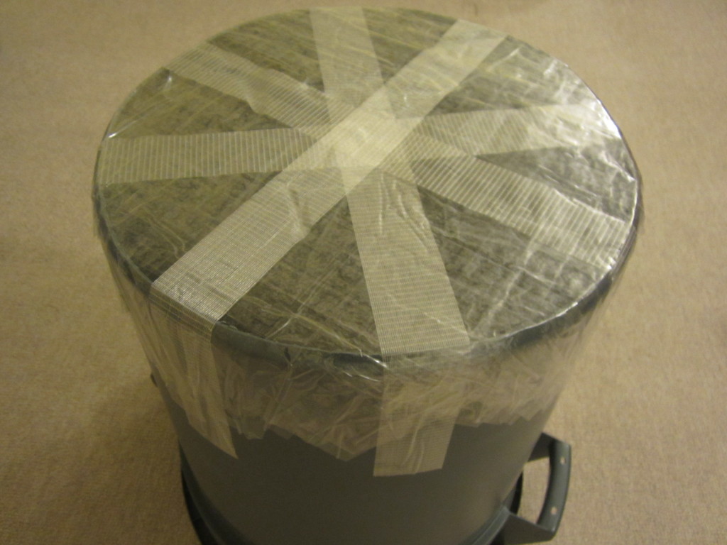 Packing tape forms the head of the garbage can taiko drum