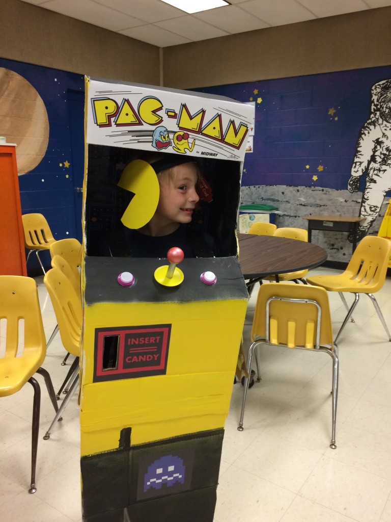 Russell wearing his Pac-Man Arcade Halloween costume