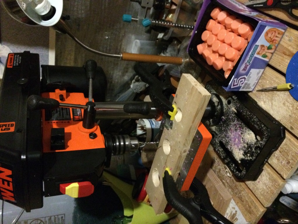 Drill press with safety set-up for drilling plastic caps