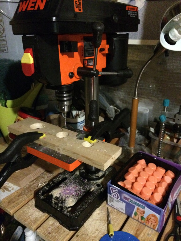 Drill press with safety set-up for drilling plastic caps