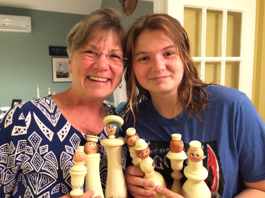 Mom & Nora with their painted angels from spindles