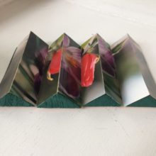 Lenticular photo display made from clementine box triangles by Trashmagination
