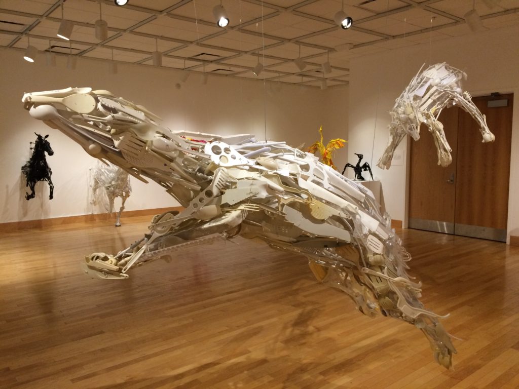 A mother and cub polar bear sculpture in an art gallery