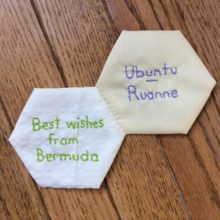 Two hexagon quilt blocks with words written on them