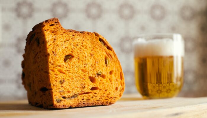 A chunk of brown bread with a glass of beer - photo by Gianluca Gerardi